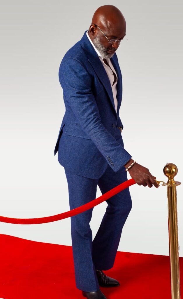 Ohiaeri Kelly Azubuike on red carpet in blue suit