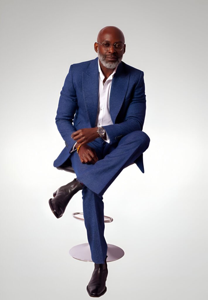 Picture of Kobo Couture CEO Ohiaeri Kelly Azubuike in a blue suit